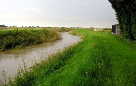 Pointon Lode swollen by heavy rain