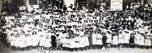 Children gather outside the Town Hall