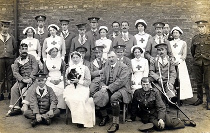 Dr Gilpin with hospital staff and patients