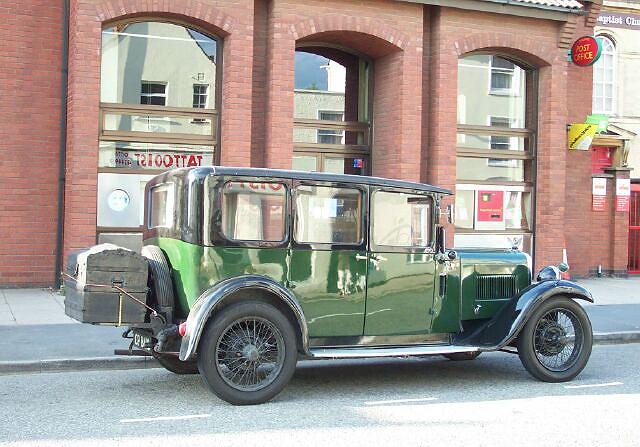 Old Austin car parked in West Street