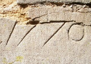 Date carved in Church Walk wall