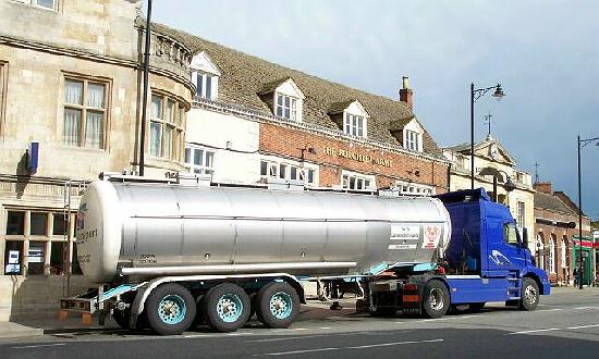 Wine tanker driving through Bourne